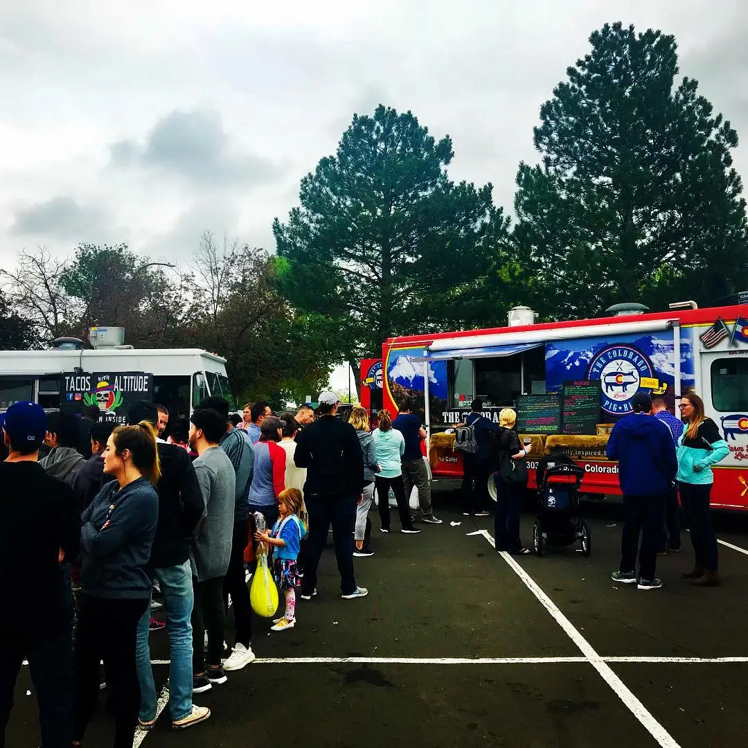 Food Truck Avenue team serving a multi-truck catering event
